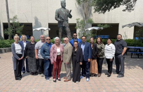 Leadership Tejas at Dr. Hector P. Flores Statue: The cohort gathers for a group shot in front of the statue honoring Dr. Hector P. Flores.