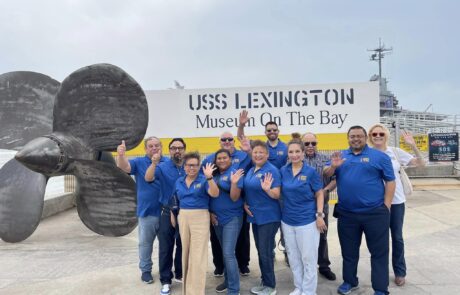 Group photo taken before boarding the historic WWII aircraft carrier, the USS Lexington.